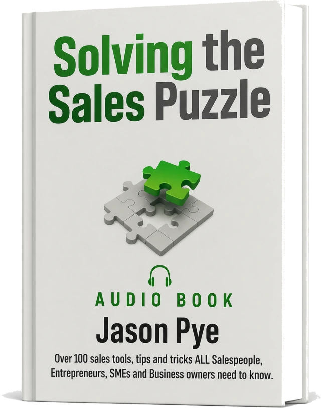 Solving the Sales Puzzle audiobook by Jason Pye. The white cover shows a grey jigsaw with one green piece lifting out, a headphones symbol, the words AUDIO BOOK, and the line: over 100 sales tools, tips and tricks all salespeople, entrepreneurs, SMEs and business owners need to know.